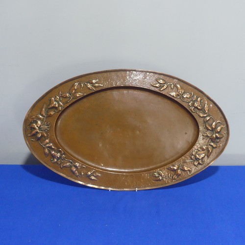 400 - An Arts & Crafts copper Charger, of circular form, with embossed sailing ship decoration, 41cm d... 