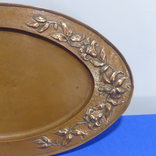 400 - An Arts & Crafts copper Charger, of circular form, with embossed sailing ship decoration, 41cm d... 