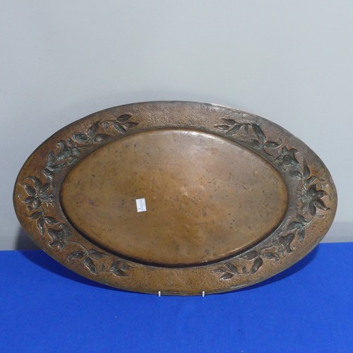 400 - An Arts & Crafts copper Charger, of circular form, with embossed sailing ship decoration, 41cm d... 