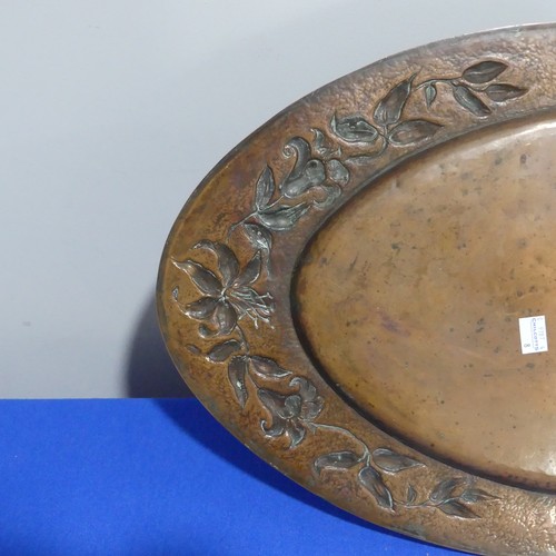 400 - An Arts & Crafts copper Charger, of circular form, with embossed sailing ship decoration, 41cm d... 