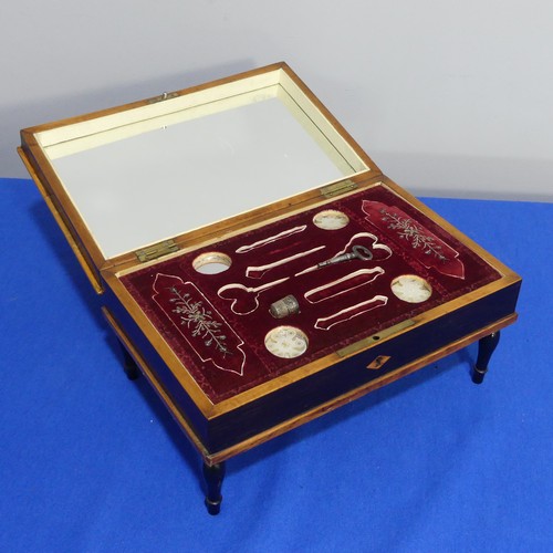 412 - A 19th century Palais Royale style rosewood and ivory inlaid musical Necessaire, in the form of a sq... 