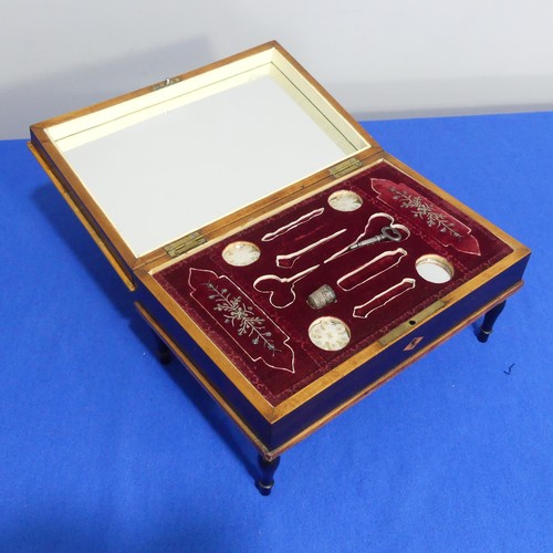 412 - A 19th century Palais Royale style rosewood and ivory inlaid musical Necessaire, in the form of a sq... 