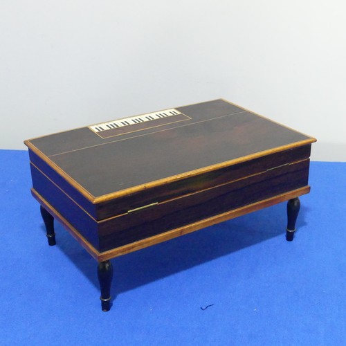 412 - A 19th century Palais Royale style rosewood and ivory inlaid musical Necessaire, in the form of a sq... 