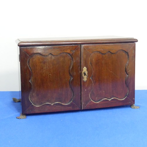 413 - A 19thC mahogany miniature Cabinet, the doors opening to reveal three frieze drawers above pigeonhol... 