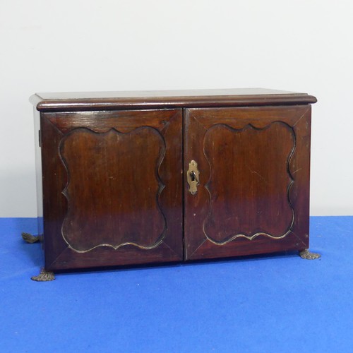 413 - A 19thC mahogany miniature Cabinet, the doors opening to reveal three frieze drawers above pigeonhol... 