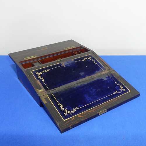 418 - A 19thC coromandel wood Writing Slope, with fitted interior and blue velvet writing surface, some da... 