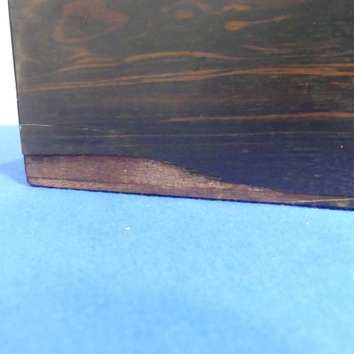 418 - A 19thC coromandel wood Writing Slope, with fitted interior and blue velvet writing surface, some da... 