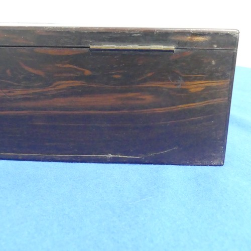 418 - A 19thC coromandel wood Writing Slope, with fitted interior and blue velvet writing surface, some da... 