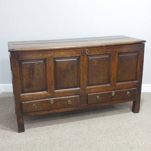 431 - A George III oak Mule Chest, with hinged lid, above four panel front, over two drawers, on square le... 