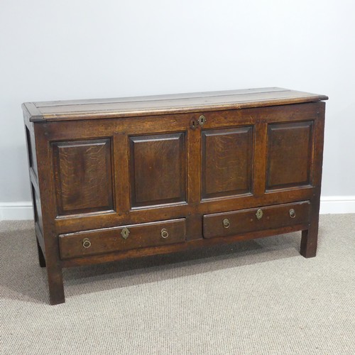 431 - A George III oak Mule Chest, with hinged lid, above four panel front, over two drawers, on square le... 