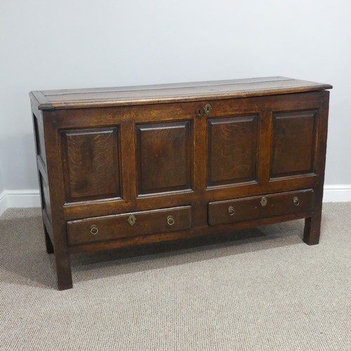 431 - A George III oak Mule Chest, with hinged lid, above four panel front, over two drawers, on square le... 