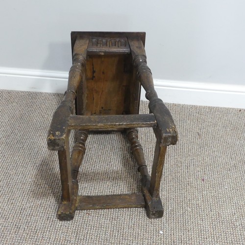 432 - An antique oak joint Stool, the rectangular seat with moulded edges, above a carved frieze, raised o... 