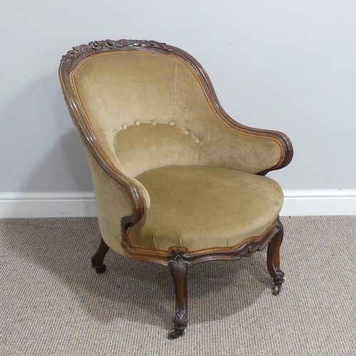 437 - A French Empire style upholstered Tub Chair, with carved floral detail, upholstered in beige, on sha... 