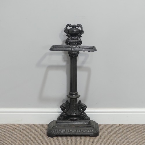 440 - A Victorian-style cast iron Stick Stand, the central column flanked by lions beneath a laurel encrus... 