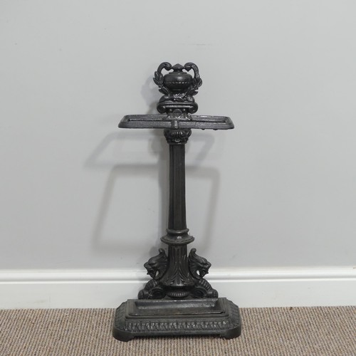 440 - A Victorian-style cast iron Stick Stand, the central column flanked by lions beneath a laurel encrus... 