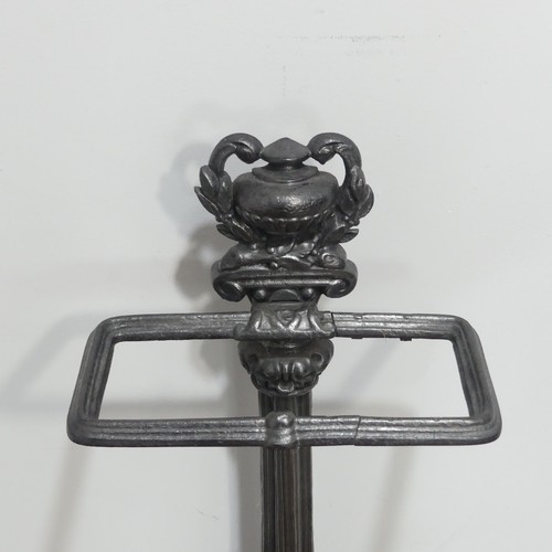 440 - A Victorian-style cast iron Stick Stand, the central column flanked by lions beneath a laurel encrus... 