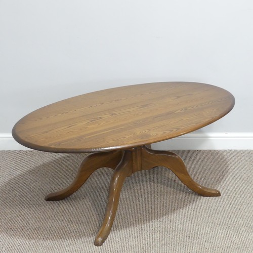 442 - An Ercol oval 'Chester' Coffee Table, on four splayed base, with metal and paper makers label to und... 