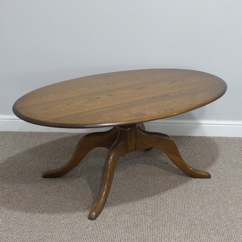 442 - An Ercol oval 'Chester' Coffee Table, on four splayed base, with metal and paper makers label to und... 