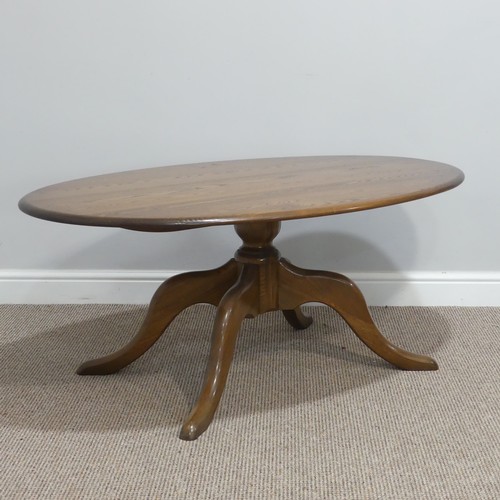 442 - An Ercol oval 'Chester' Coffee Table, on four splayed base, with metal and paper makers label to und... 