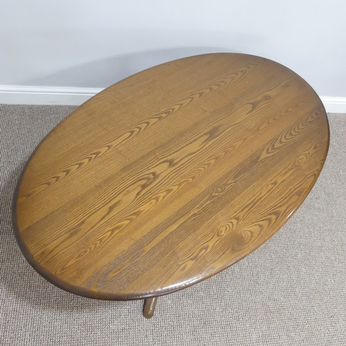 442 - An Ercol oval 'Chester' Coffee Table, on four splayed base, with metal and paper makers label to und... 