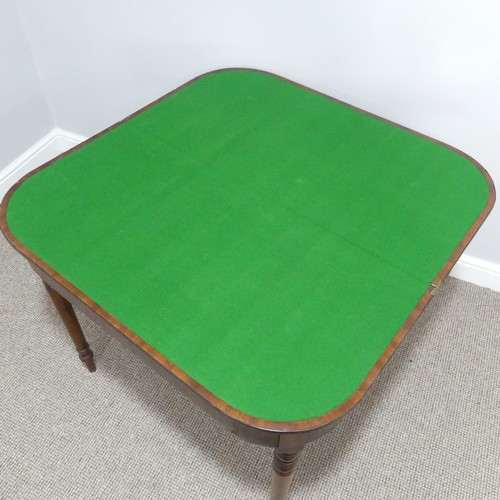 291 - A Georgian mahogany Card Table, the fold-over top revealing circular green baize inset, raised upon ... 