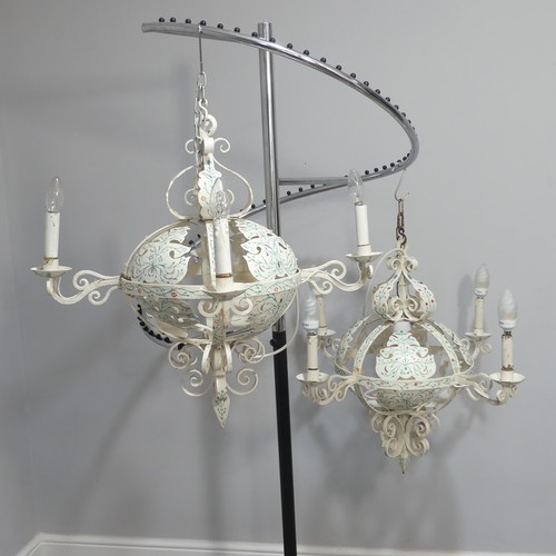 295 - A pair of painted wrought iron ceiling  Chandeliers, of globe form decorated with flowers, each with... 