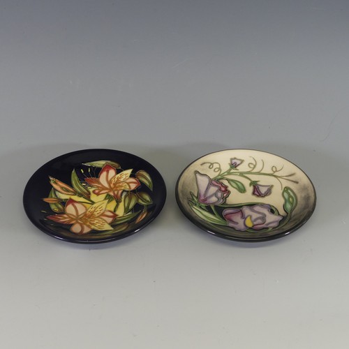 36 - A Moorcroft 'Sweetpea' pattern Pin dish, tube lined decoration on a smoky ground, with painted and p... 