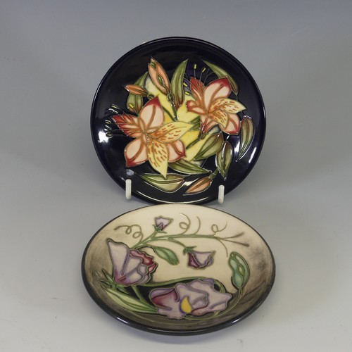 36 - A Moorcroft 'Sweetpea' pattern Pin dish, tube lined decoration on a smoky ground, with painted and p... 