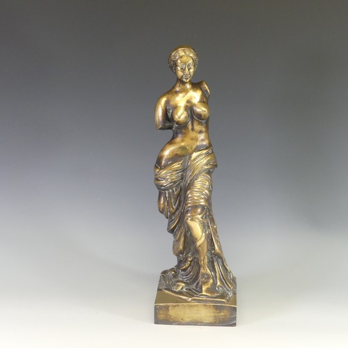 242 - A gilt brass figure of Venus De Milo, modelled after the antique, raised on an integral plinth, H 48... 