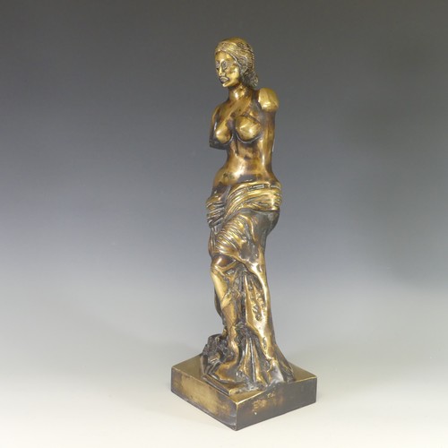 242 - A gilt brass figure of Venus De Milo, modelled after the antique, raised on an integral plinth, H 48... 