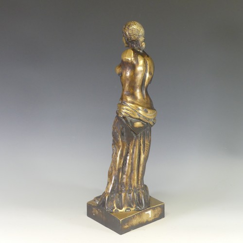 242 - A gilt brass figure of Venus De Milo, modelled after the antique, raised on an integral plinth, H 48... 