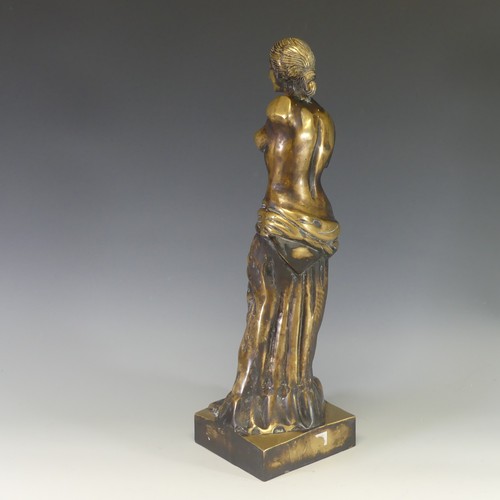 242 - A gilt brass figure of Venus De Milo, modelled after the antique, raised on an integral plinth, H 48... 