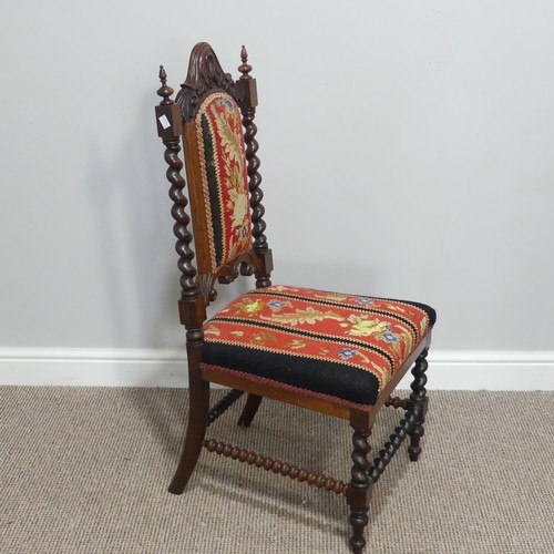 296 - A 19thC Rosewood and Woolwork Hall Chair, with a carved and shaped back rest, spirally turned suppor... 