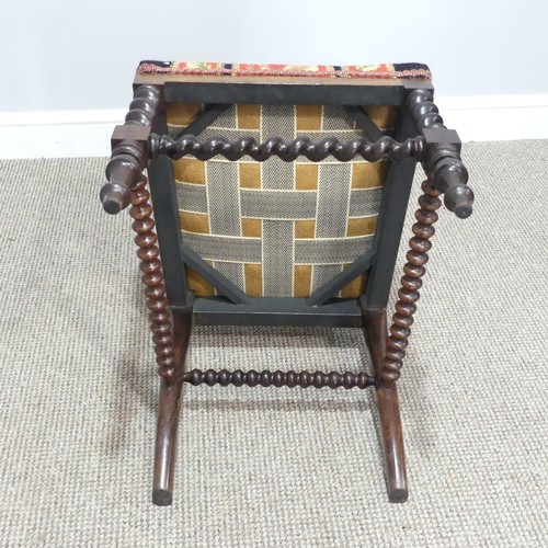 296 - A 19thC Rosewood and Woolwork Hall Chair, with a carved and shaped back rest, spirally turned suppor... 