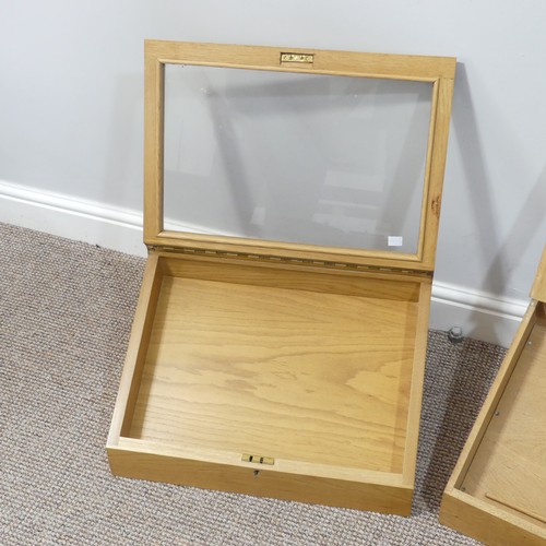 456 - A pair of oak table-top Display Cabinets, of sloped form with glazed hinged lid, W 51cm x D 39cm x H... 