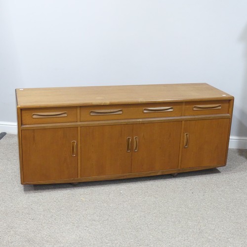 459 - A mid 20thC retro G Plan teak 'Fresco' low Sideboard, three drawers over four cupboards, on ball cas... 