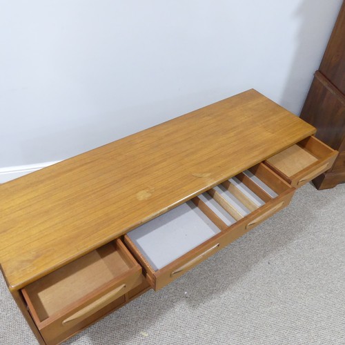 459 - A mid 20thC retro G Plan teak 'Fresco' low Sideboard, three drawers over four cupboards, on ball cas... 