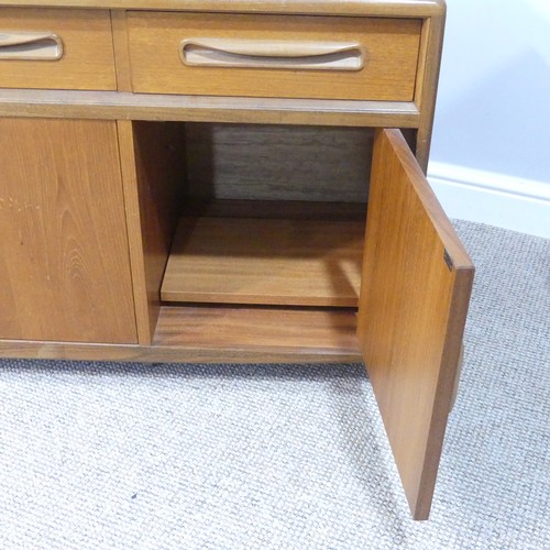 459 - A mid 20thC retro G Plan teak 'Fresco' low Sideboard, three drawers over four cupboards, on ball cas... 