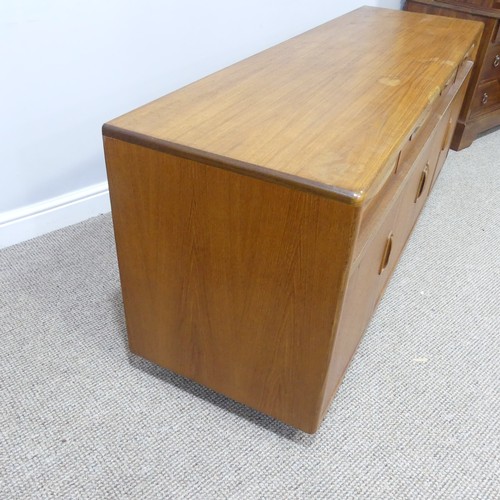 459 - A mid 20thC retro G Plan teak 'Fresco' low Sideboard, three drawers over four cupboards, on ball cas... 