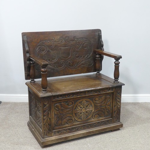 464 - A Victorian carved oak Monks Bench, of rectangular form, with typical hinged box seat base, and turn... 