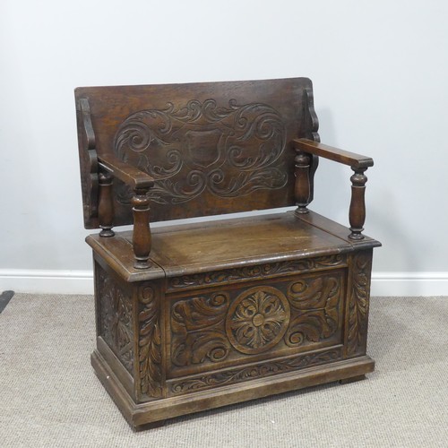 464 - A Victorian carved oak Monks Bench, of rectangular form, with typical hinged box seat base, and turn... 