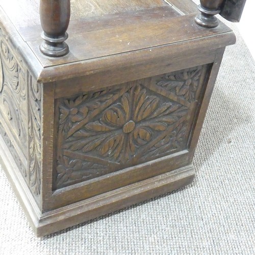 464 - A Victorian carved oak Monks Bench, of rectangular form, with typical hinged box seat base, and turn... 