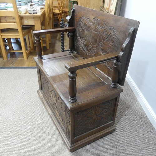 464 - A Victorian carved oak Monks Bench, of rectangular form, with typical hinged box seat base, and turn... 