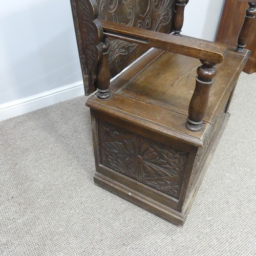 464 - A Victorian carved oak Monks Bench, of rectangular form, with typical hinged box seat base, and turn... 