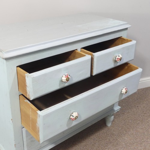 469 - An antique painted pine Chest of Drawers, with two short and two long drawers with ceramic handles, ... 