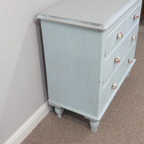 469 - An antique painted pine Chest of Drawers, with two short and two long drawers with ceramic handles, ... 