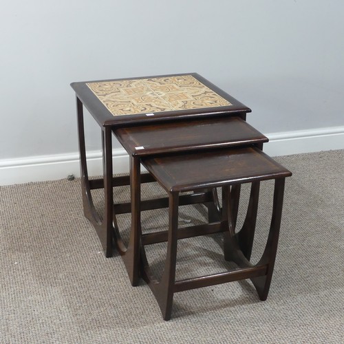 479 - A retro G Plan teak nest of square Tables, the top table inset with four tiles, W 50cm x D 50cm x H ... 