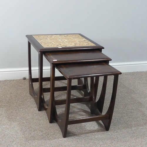 479 - A retro G Plan teak nest of square Tables, the top table inset with four tiles, W 50cm x D 50cm x H ... 