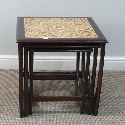 479 - A retro G Plan teak nest of square Tables, the top table inset with four tiles, W 50cm x D 50cm x H ... 