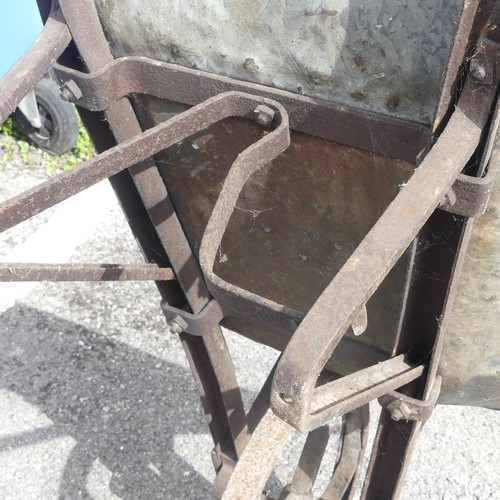 483 - An antique rustic metal Wheelbarrow, with spoked wheel and two handles, rusted and weathered, 155cm ... 